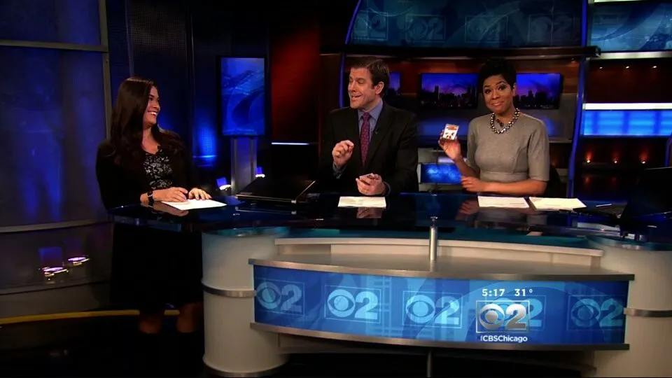 CBS Chicago news anchors with Iggy trading cards